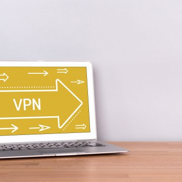 turbovpn vpn service laptop on desk with vpn and right arrow on display